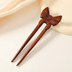 Épingle à cheveux en bois exquise avec nœud, pince à chignon sculptée pour coiffure élégante.
