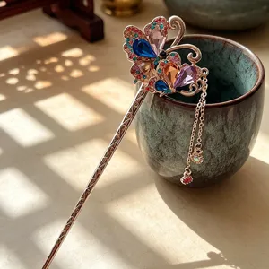 Exquisite Chinese style rhinestone butterfly hair stick with elegant tassel for Hanfu dresses.