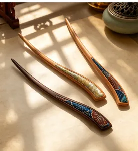 Detailed view of traditional Chinese wooden hairpins featuring exquisite wave fabric inserts for styling.