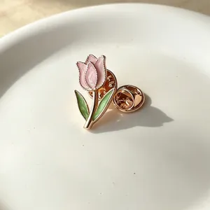 Vintage enamel tulip lapel pin badge for women, elegant pink flower brooch for clothing.