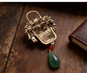 Retro vintage flower basket brooch with green teardrop stone tassel for qipao collar pin.