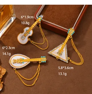 Broche instrumento musical borla vintage diamantes abrigo accesorio mujer chic moda