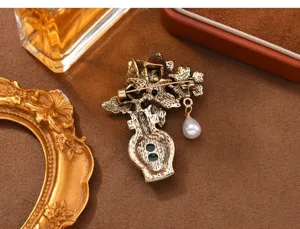 Detailed view of the vintage Chinese style vase brooch back, showing the pin structure.