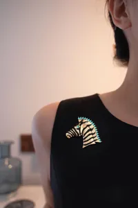 Vintage turquoise zebra brooch metal enamel animal lapel pin sweater jacket accessory.