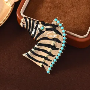 Vintage enamel zebra brooch with turquoise beads, elegant animal fashion pin for apparel.