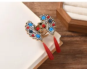Vintage Chinese style butterfly hair claw clip with enamel flowers pearls and red tassels.