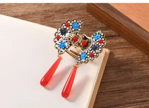 Vintage Chinese style hair claw clip with exquisite blue enamel flowers and elegant red tassels.