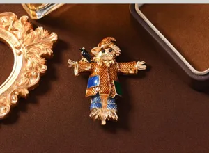 Vintage enamel scarecrow brooch close-up shot, retro decorative pin for winter coats and apparel.