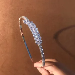 Sparkling crystal rhinestone thin headband detail view, exquisite zircon marquise leaf design.