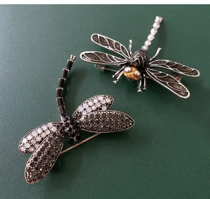 Exquisite rhinestone dragonfly brooch detailed shot, vintage enamel insect pin for women coat.