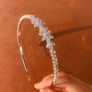 Delicate rhinestone thin headband close-up shot, sparkling crystal zircon hairband for daily wear.