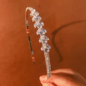 Detailed shot of a sparkling rhinestone thin hair hoop with exquisite cubic zirconia design.