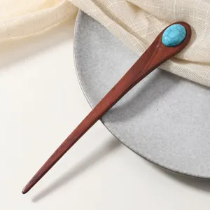 Red sandalwood hairpin with faux turquoise stone, simple U-shaped design for elegant hair buns.