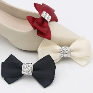 Elegant satin rhinestone bow shoe clips in multiple colors for bridal wedding heels.