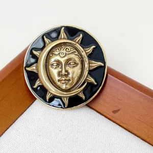 Vintage sun and moon face relief metal brooch creative black enamel badge pin coat accessory