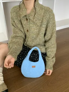 Knit handbag for women, casual solid color underarm bag, soft autumn winter daily commute style.