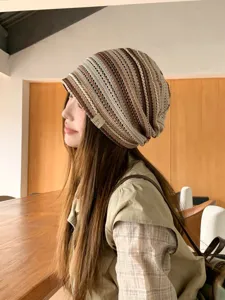 Retro striped knit slouchy beanie for women, breathable hollow-out design for spring and summer.