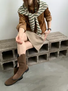 Korean style striped knit triangular shawl scarf detail view showing cozy autumn winter fashion