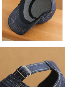 Nahaufnahme der Vintage-Jeans-Plattekappe mit verstellbarer Metallschnalle und Nähten.
