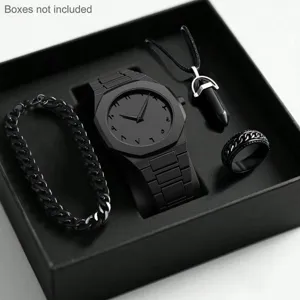 Black quartz watch set detail showing minimalist dial, bracelet, ring, and pendant necklace.