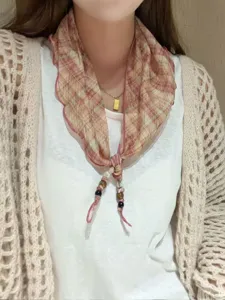 Detailed shot of a stylish Korean floral triangular scarf with beaded ends, perfect for summer.