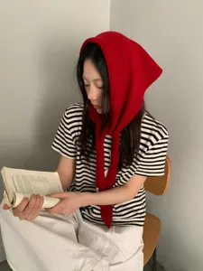 Details of the red knit hollow triangular scarf, soft wool neck warmer shawl for women.
