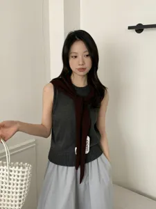 Women sleeveless knit top and brown scarf set, stylish autumn winter daily wear style.