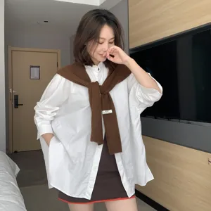 Korean style white long sleeve shirt with brown knit shawl layered outfit for women casual wear.