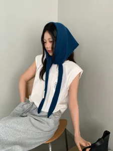 Dark blue knitted triangular hood scarf with long ties for women winter warmth style.