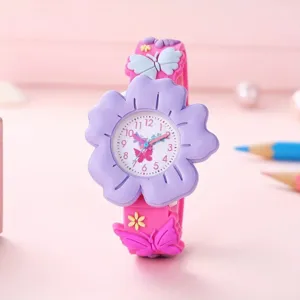 Cute silicone children quartz watch with purple flower dial and butterfly strap details.