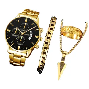Men's luxury gold watch set with steel band, bracelet, ring, and arrow pendant necklace.