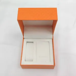 Luxury orange watch box and jewelry gift storage box with white interior slots for watches and necklaces.