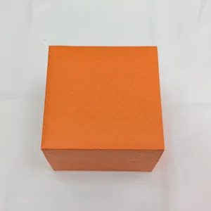 Orange watch gift box with textured surface, perfect for luxury jewelry and watch storage.