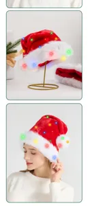 Macro view of plush Santa hat with glowing LED lights for Christmas celebrations