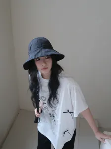 Detailed view of the lightweight breathable sun protection bucket hat for women, summer style.