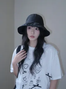 Lightweight breathable sun protection bucket hat for women, stylish summer UV blocking hat.