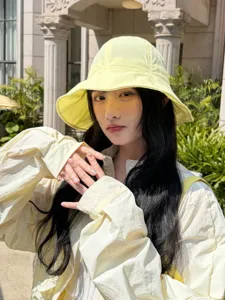 Lightweight breathable sun protection bucket hat for women, summer UV proof casual outdoor basin hat.