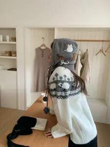 Cute cat knit balaclava hat and cozy patterned sweater for women winter warm stylish headwear.