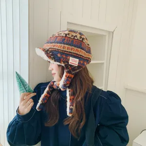 Retro Lammwolle ethnischer Stil Plüsch Ohrenklappenmütze für Damen, warme Winter Windschutz
