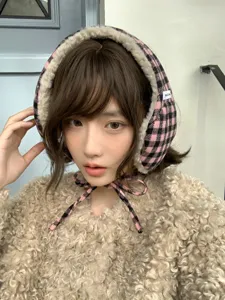 Chic pink black plaid fuzzy earmuffs detail view, cozy winter thermal ear warmer with cute ties.