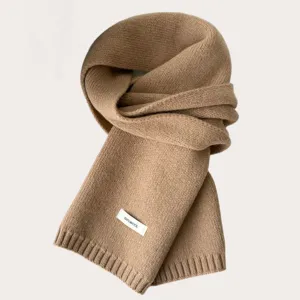 Detailed view of the cozy camel knitted wool scarf, showing fine texture and warmth for winter.