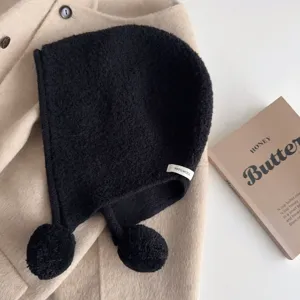 Black knitted balaclava winter warm wool hat with cute pom poms for women stylish chilly weather