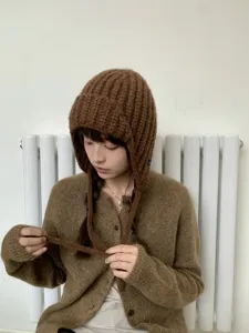 Cozy brown knitted balaclava hat for women, thick wool winter ear-protecting warm pilot cap.