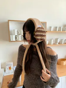Korean winter plush earmuffs with long straps, cozy warm furry ear warmers for women.