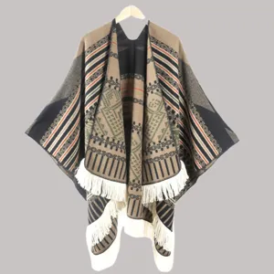 Ethnic style knit poncho cloak with tassels, warm winter cape for travel and casual daily wear.