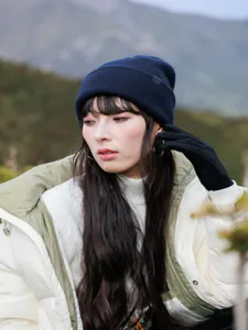Outdoor winter warm pure wool knitted beanie hat for women, solid color cuffed design.