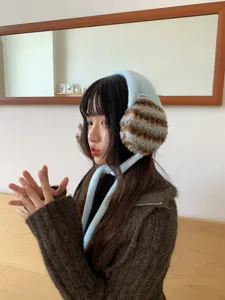 Winter plush fuzzy earmuffs with cute straps warm winter ear warmers for women.