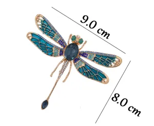 Exquisite Libellen-Brosche mit blauen Emaillierten Flügeln und großen Kristallsteinen.