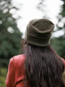 Close-up view of the cozy wool knit beanie featuring fine texture and stylish folded cuff.