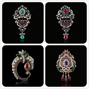 Vintage baroque crystal rhinestone brooch details, elegant women clothing accessories.